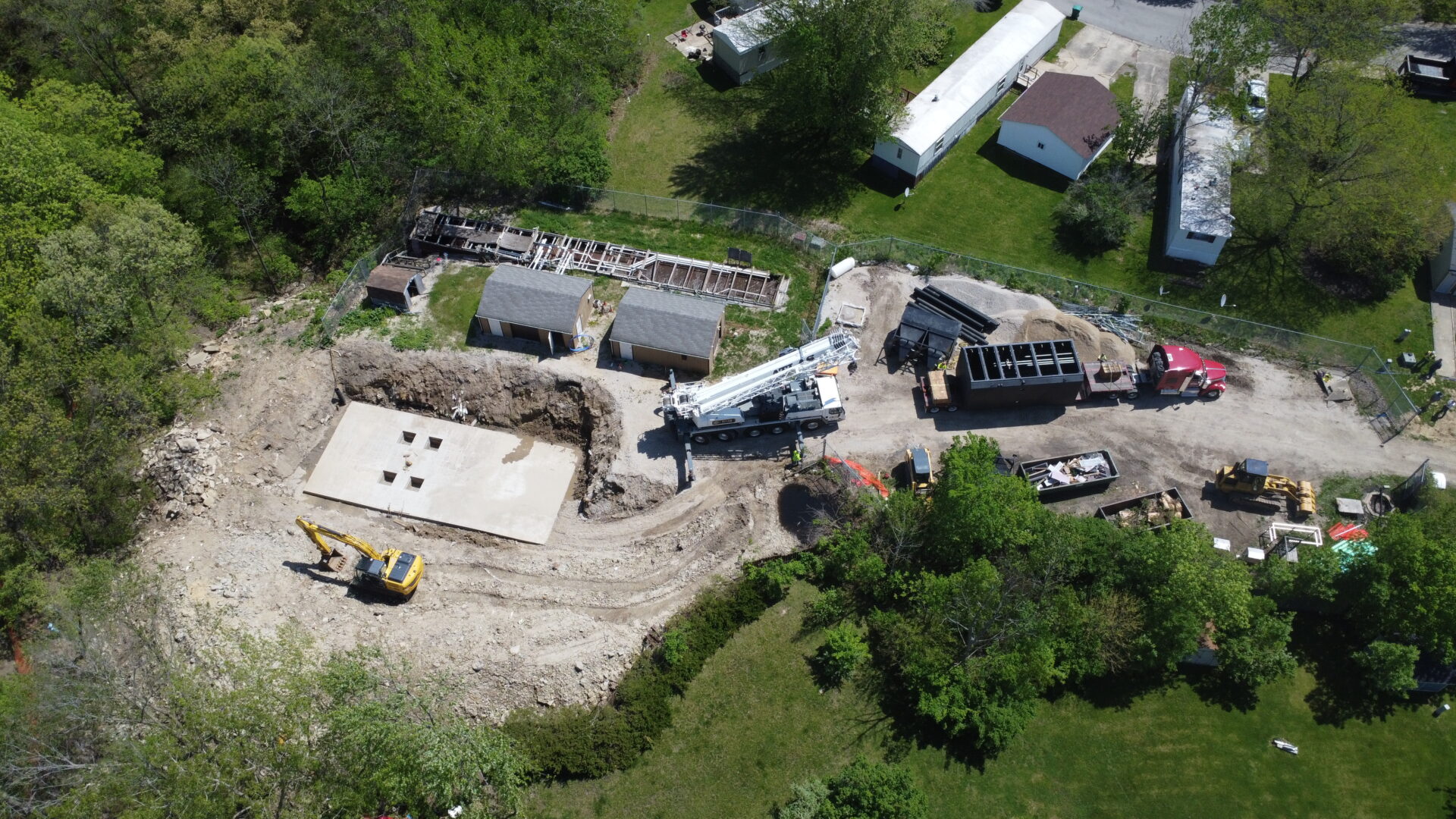 Aerial view of an active construction site with machinery.